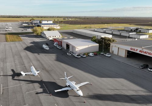 Private jets and hangars at Gulf Aviation's FBO ramp in the Rio Grande Valley.